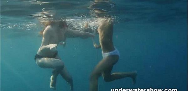  Nastya and Masha are swimming nude in the sea